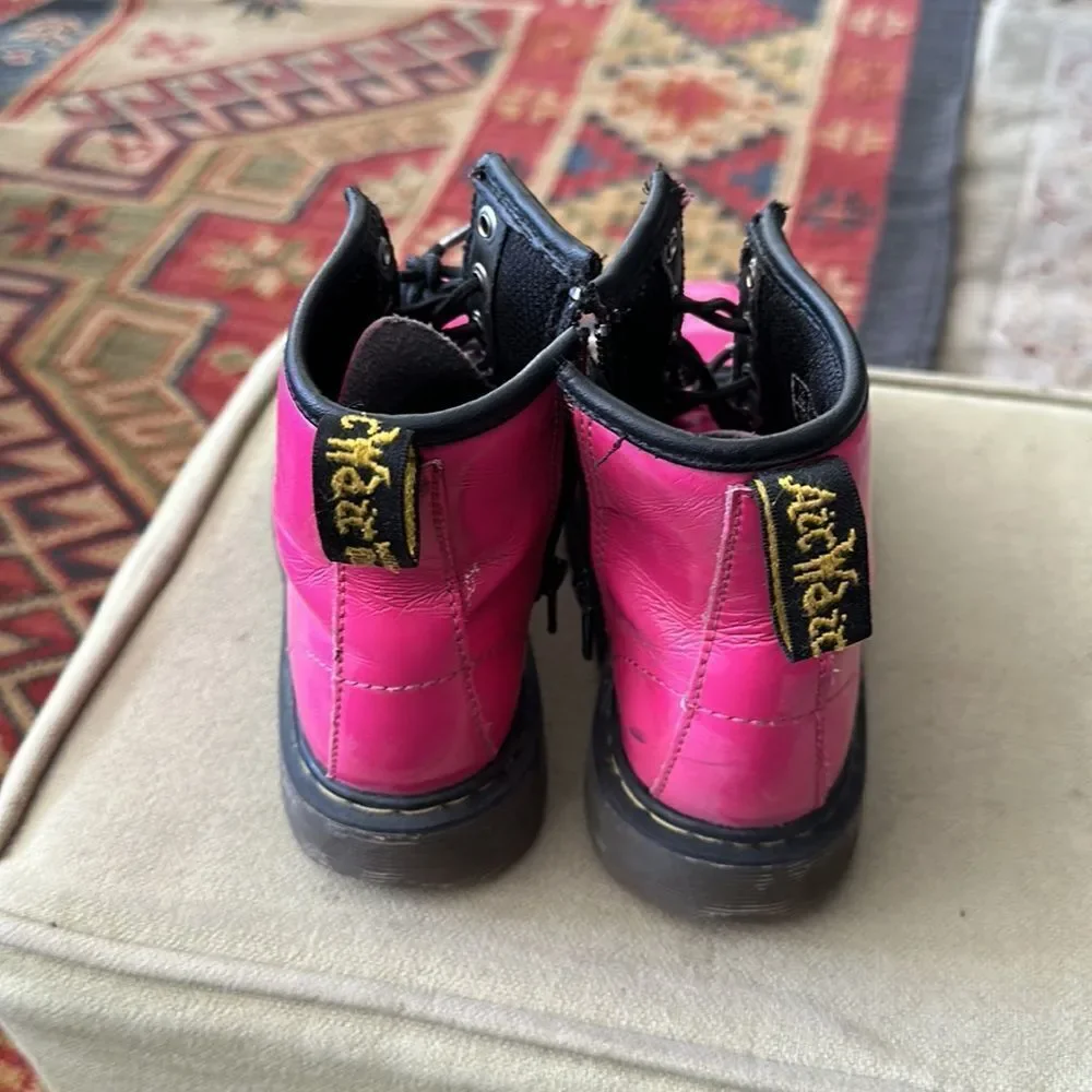 Dr. Martens - pink lace-up boots. For your punk rock girrrrrl.